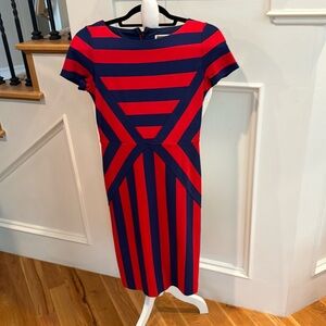 Extremely flattering dress red and navy striped design, like new